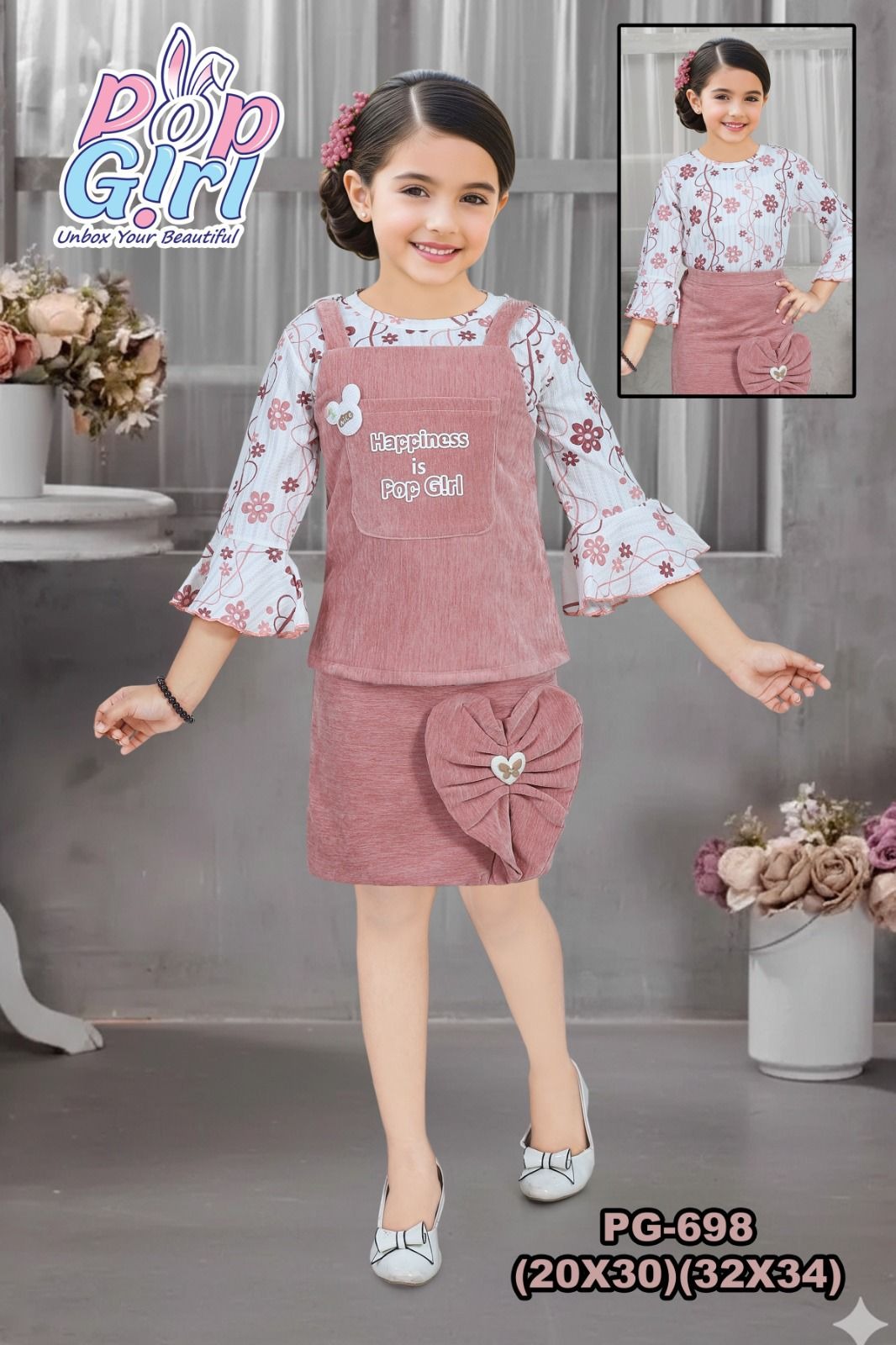 Smiling girl in a floral Pop Girl dress
